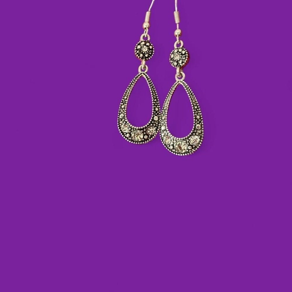 Silver tone and black rhinestone eardrop earrings #glamour